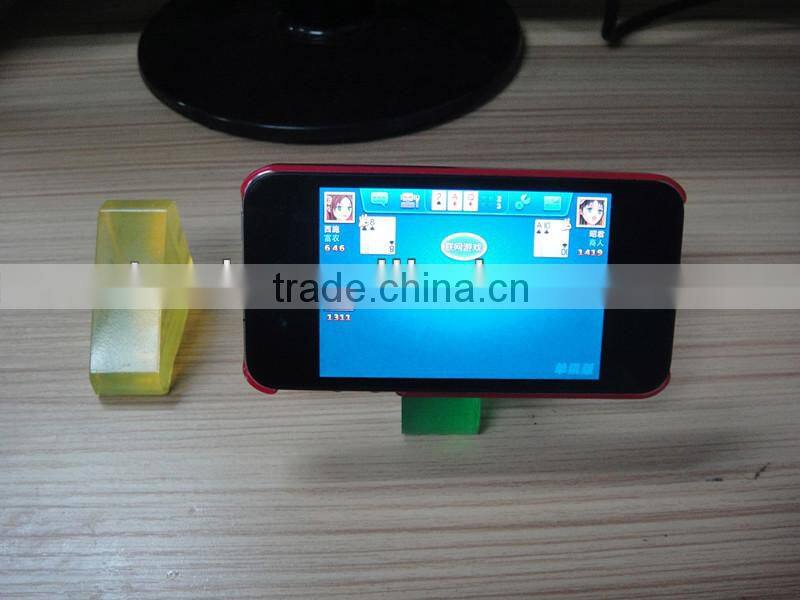Universal dashboard cell phone holder