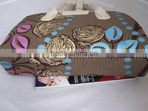 African printed wax fabric and leather bag