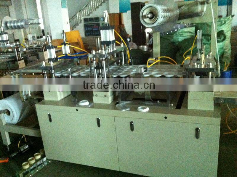 Full-automatic plastic cover making machine