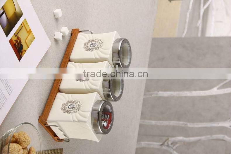 ceramic canister set with stainless lid & wooden stand