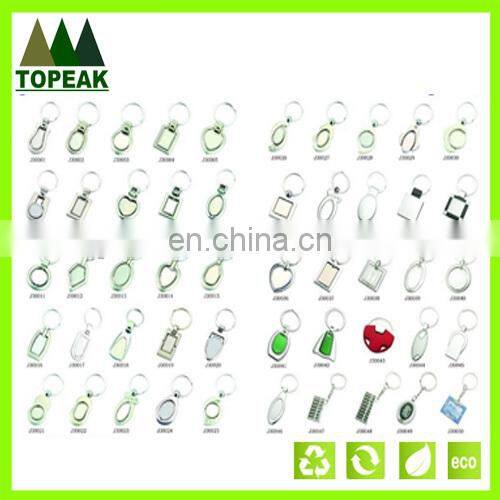 Promation cute cartons rubber gift metal keychain key ringsr key chains