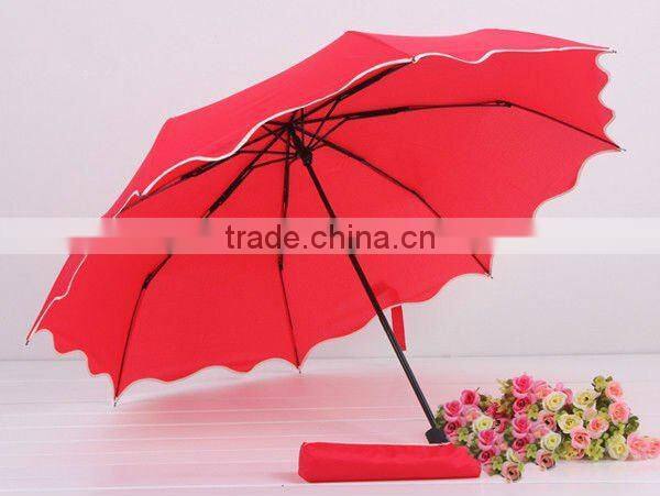 three folding Rain or shine red umbrella