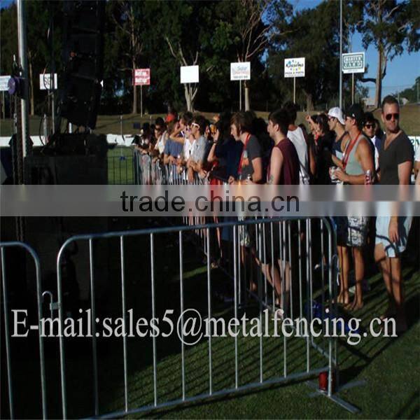 Out door orange painted crowd control for temp fence