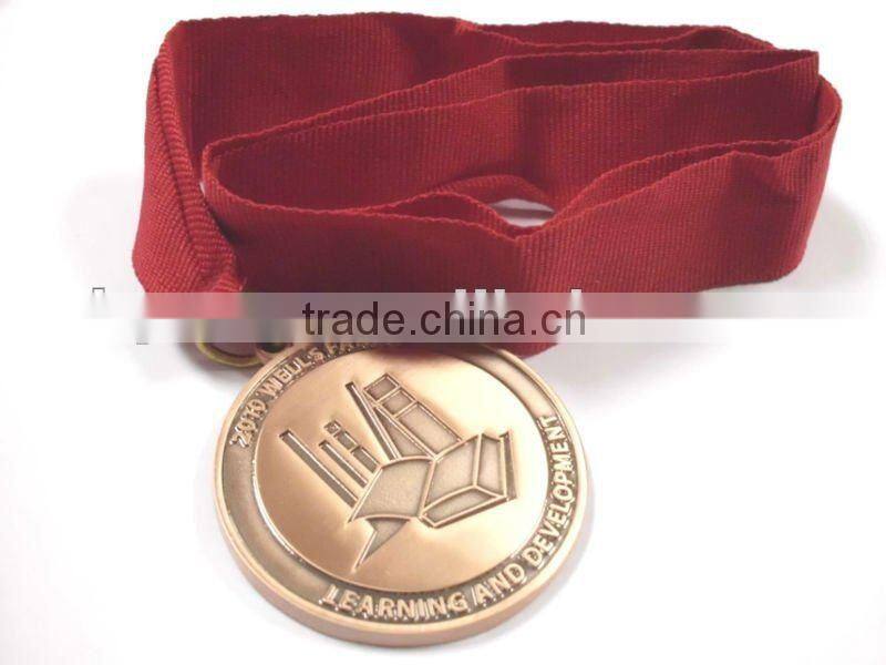 fancy engraved golden medal