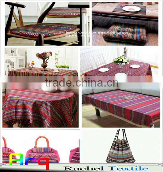 Multi colored fabric with many bright color, stripe design using for home textile or garments