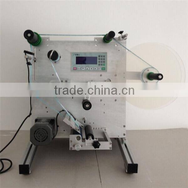 2015 Guangzhou semi-automatic multifunctional round bottle labeling machine with PLC control