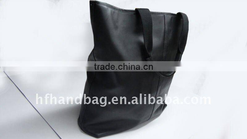 large black leather tote bag