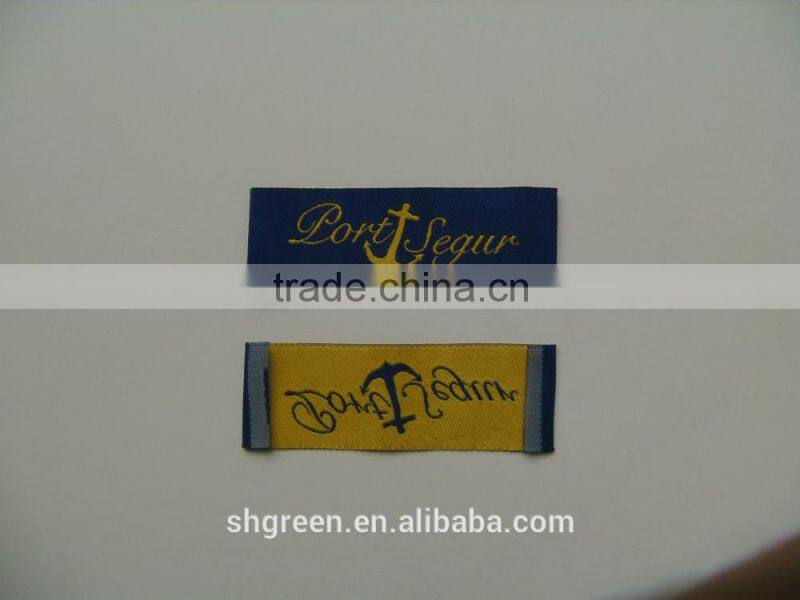 high density t-shirt bottom center fold woven label
