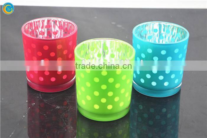 orange dotted glass candle holder