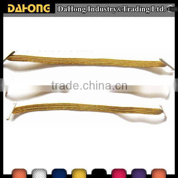 Metallic gold elastic band with metal tips