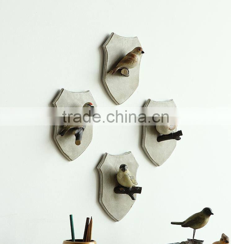 beautiful polyresin bird wall decoration , wall hook wholesale for living room