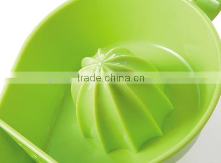 Plastic material food grade cheap simple creative orange squeezer wholesale
