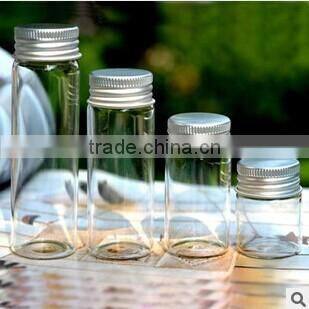 Wholesale small glass candy jar with screw lid