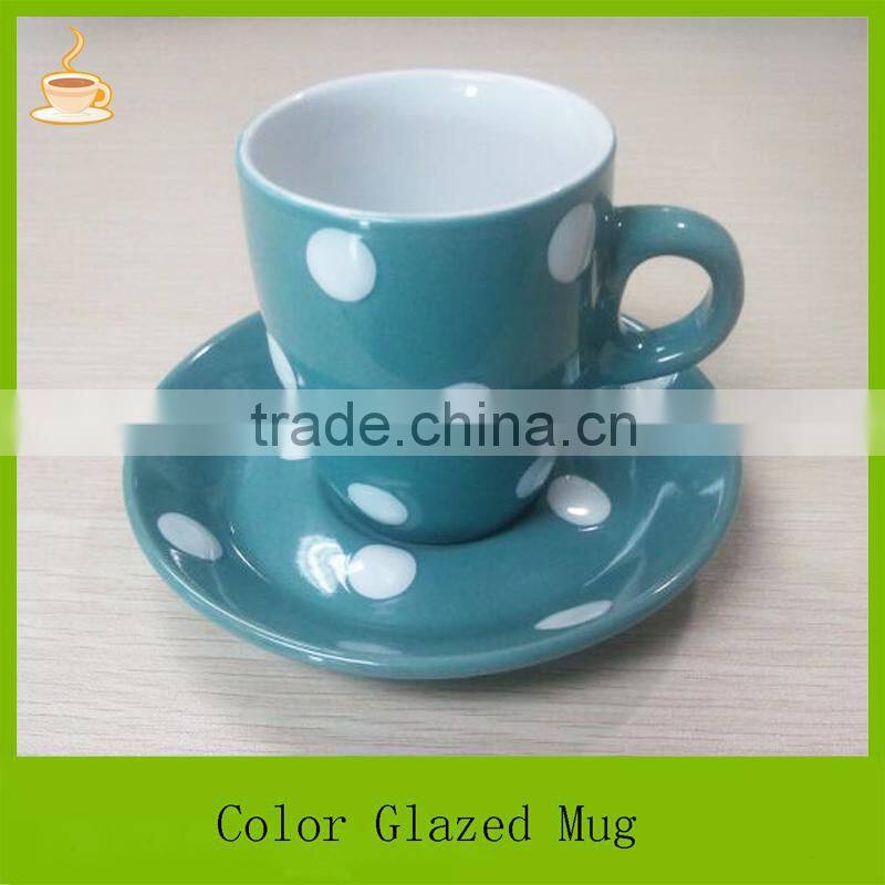 Samll size porcelain coffee mug with saucer set, black and green color glazed with white dots