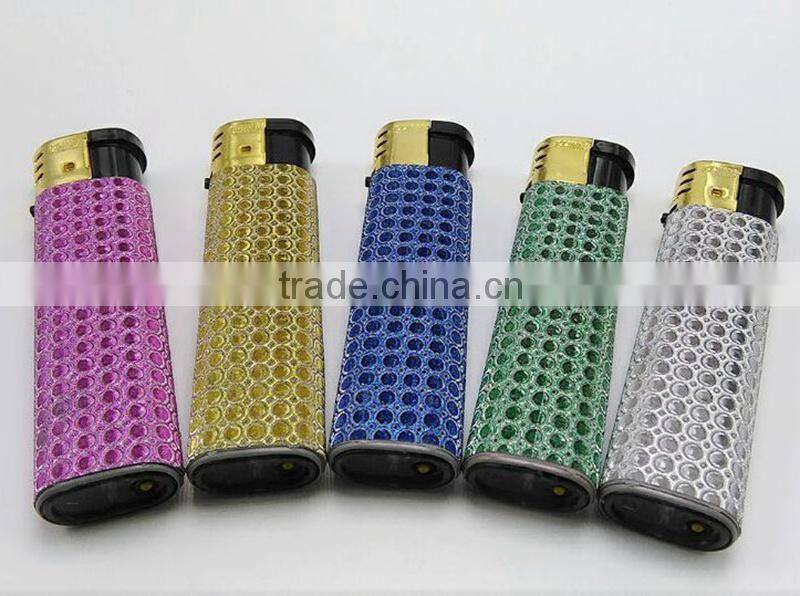 Silver match lighters colored with golden cap star lighter