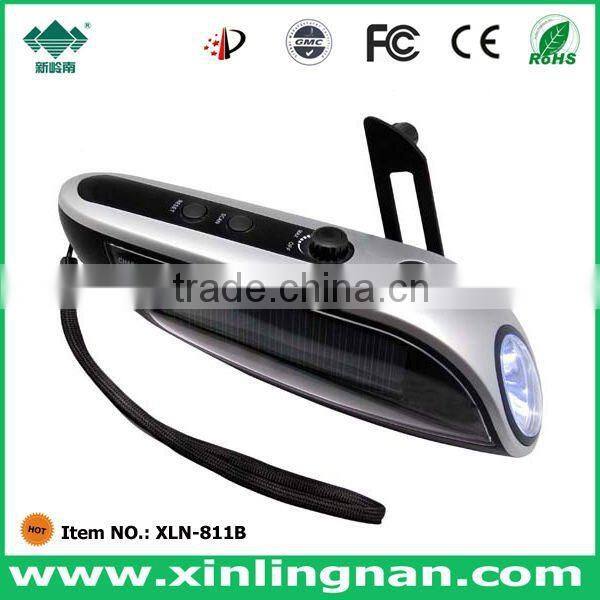 Winding charge solar flashlight radio