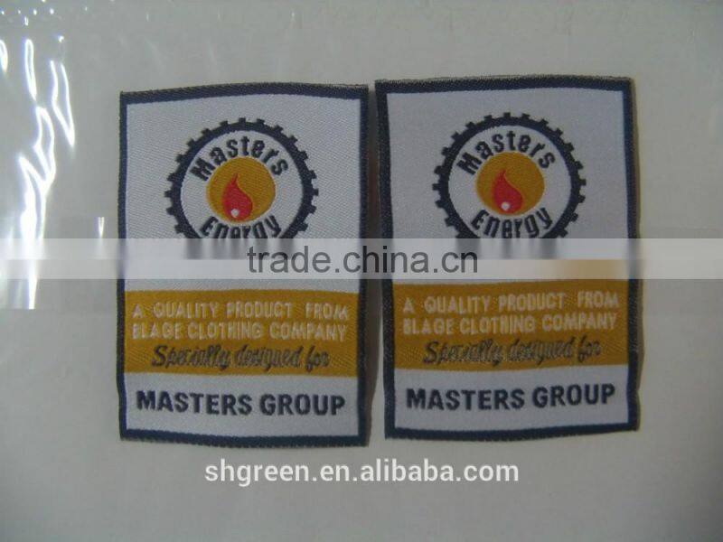 Mid-fold woven flag tag for apparel