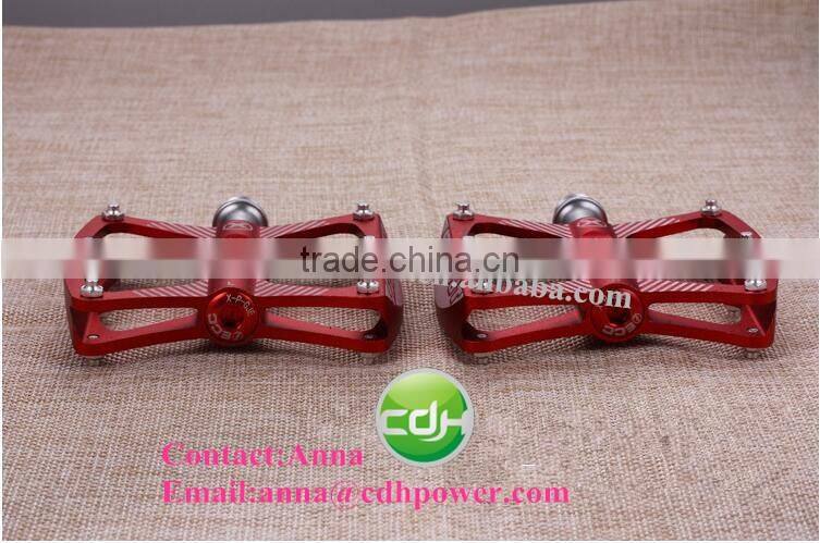 Red color mountain racing bike pedals