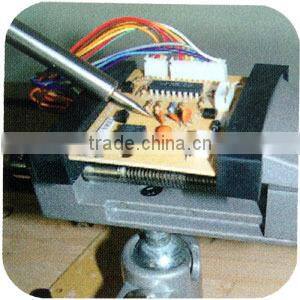 Universal table vice with drill clamp