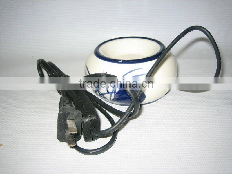 electrical aroma/oil burner with heating plate