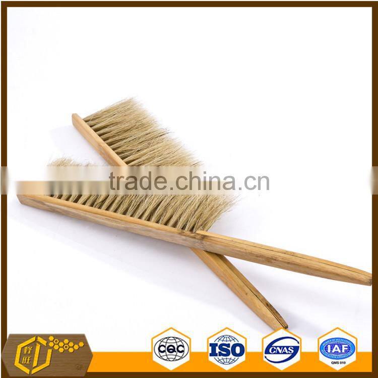 wooden hand beekeeping beehive frame cleaning