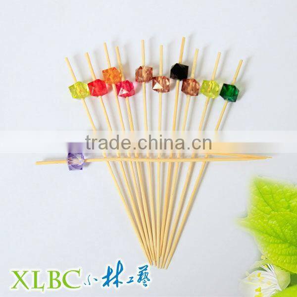 Bamboo picks with rose for party