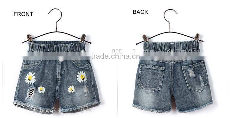 OEM service bulk wholesale sunflower print denim baby jeans with fray hem