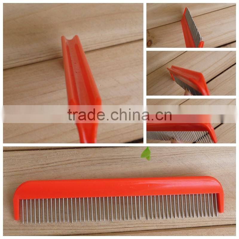 Plastic dog comb with adjustable needles