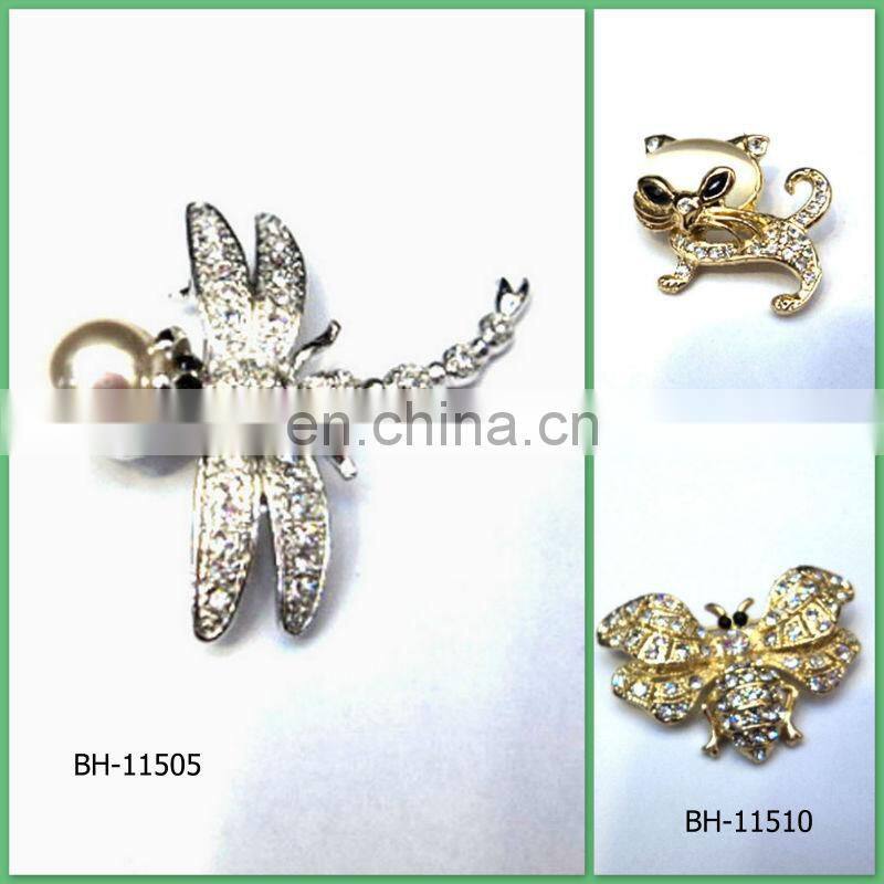 Gold crystal spider brooch