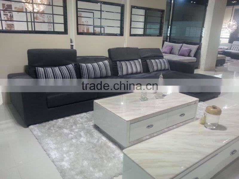 stripy pillow deep grey sofas