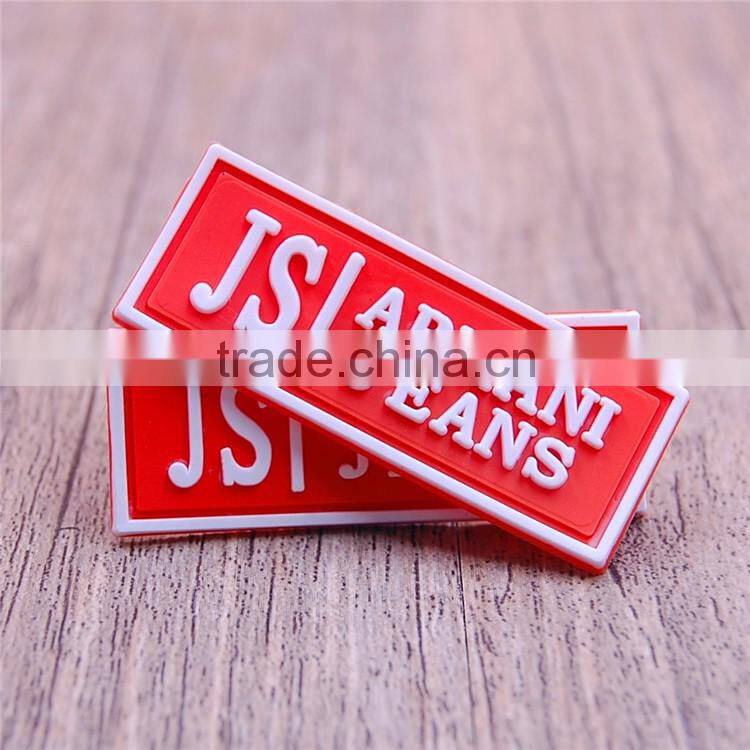 Custom wholesale red pvc labels tags for shirt clothing garment