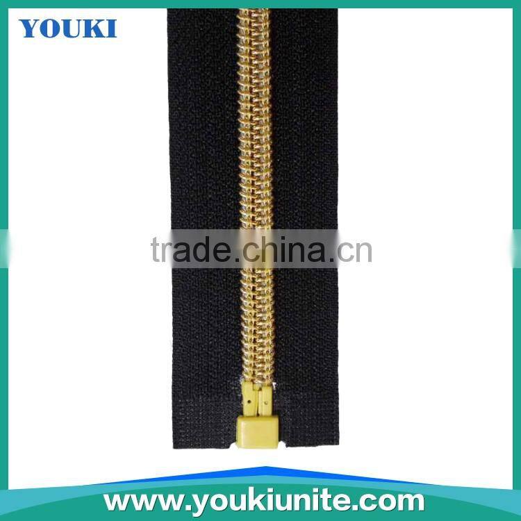 5# Woven Tape Nylon Zipper Open-end With Gold Teeth Auto Lock YKN-2008
