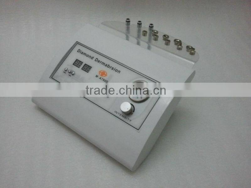 Portable diamond tip microdermabrasion machine