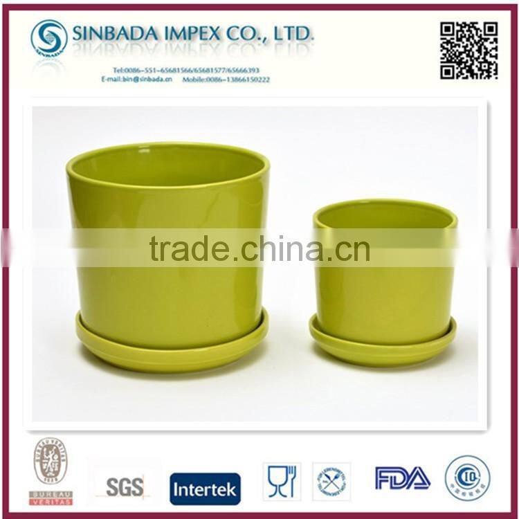 bright-coloured outdoor flower pots decorate garden