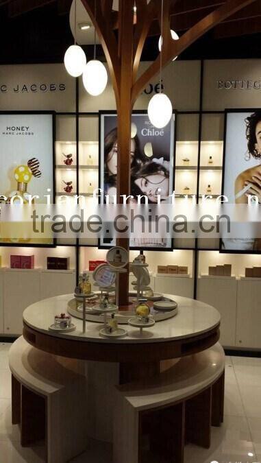 Hi Macs / Corian solid surface made center cashier desk for optical store design