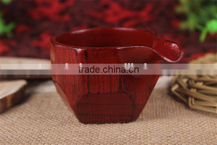 With a mouth wooden wine glass