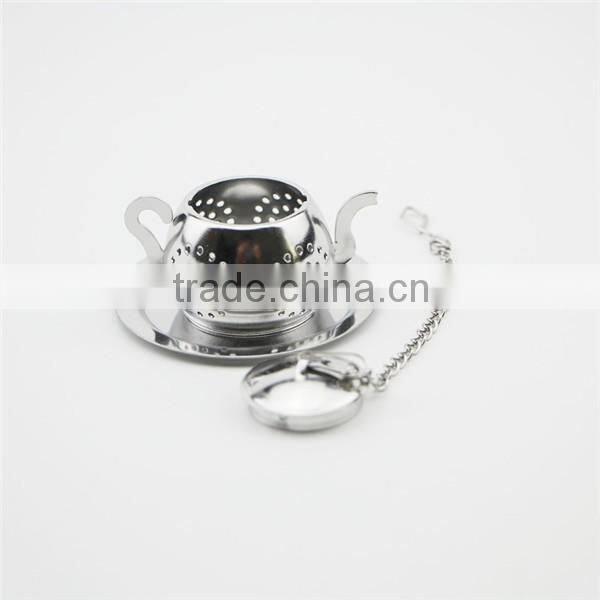 Small stainless steel teapot shaped strainer