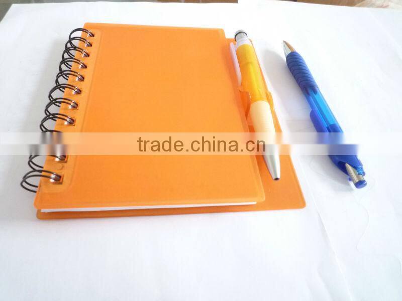 Hard cover spiral A5 notebook with pen