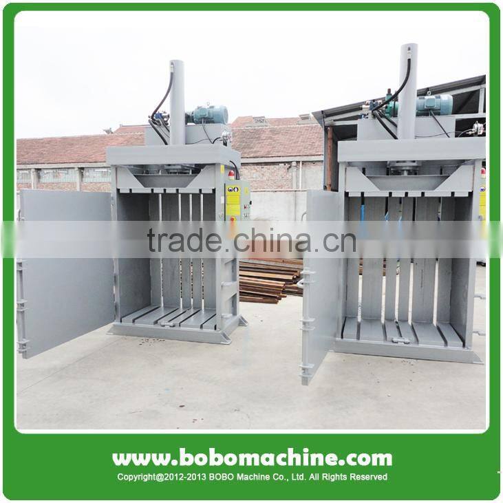 Electronic button control scrap cardboard baler