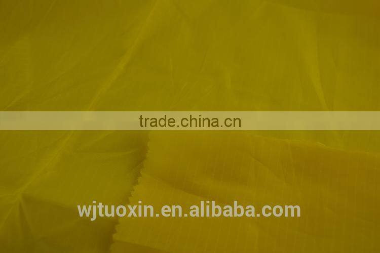 210T ripstop polyester waterproof child raincoat fabric soft smooth tough material