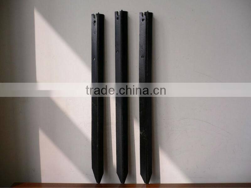 green painted farm fencing used t bar fence post