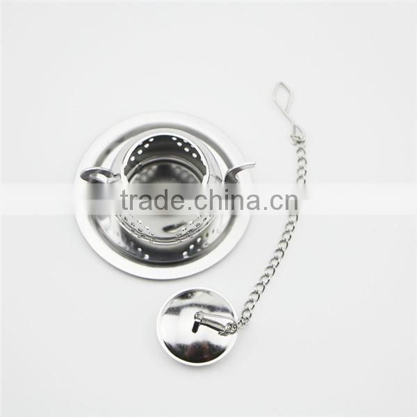 Small stainless steel teapot shaped strainer