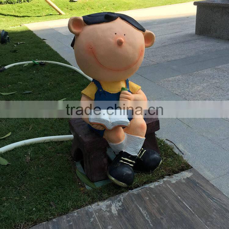 FRP student figurine in garden