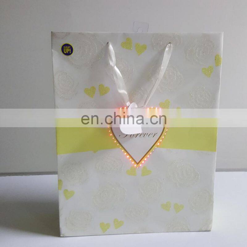 Customized your style lighting up presenting musical Christmas paper bag for gift