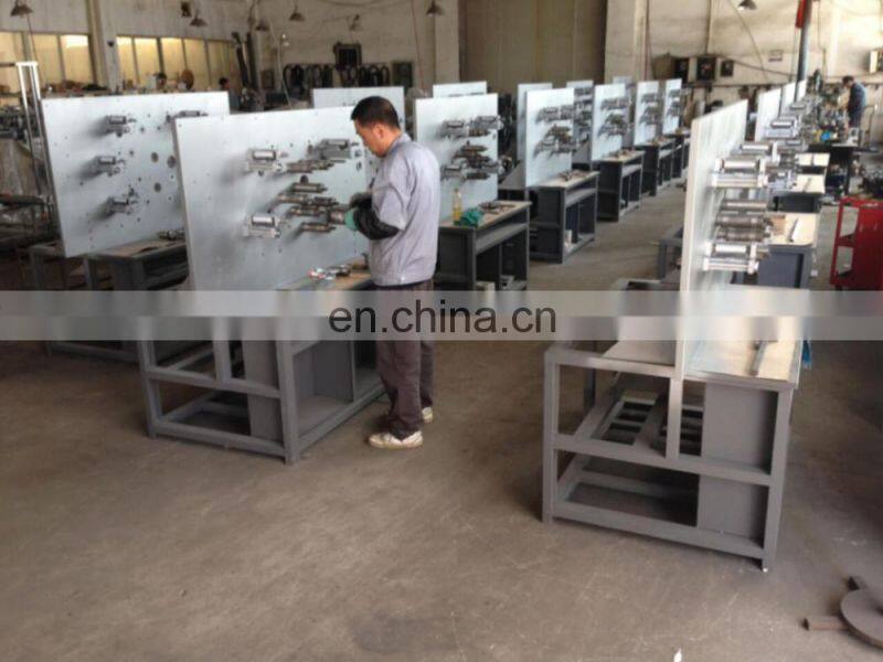 UGS1006 maquina impresora rotativa para etiqueta de lavado Automatic rotary letterpress label printer