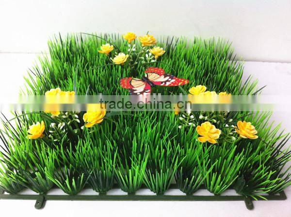 alibaba Beautiful artificial grass carpet with flower for garden decor