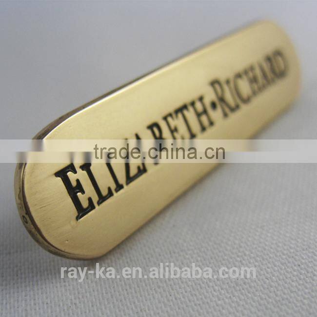 small metal logo name plate