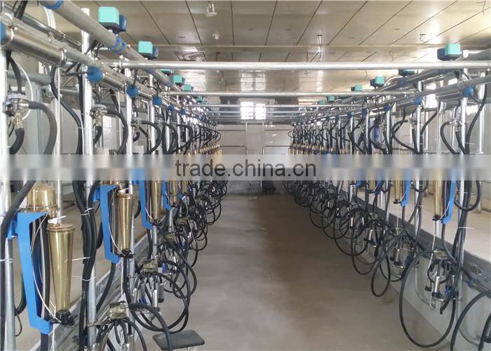 Milking Machine System with Automatic Cluster Remover