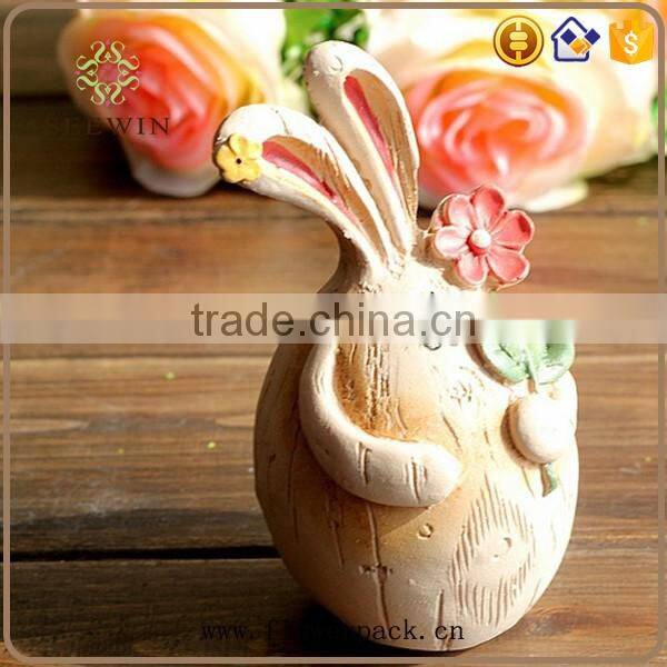 Thin rabbit rabbit couples rustic style to pick a flower