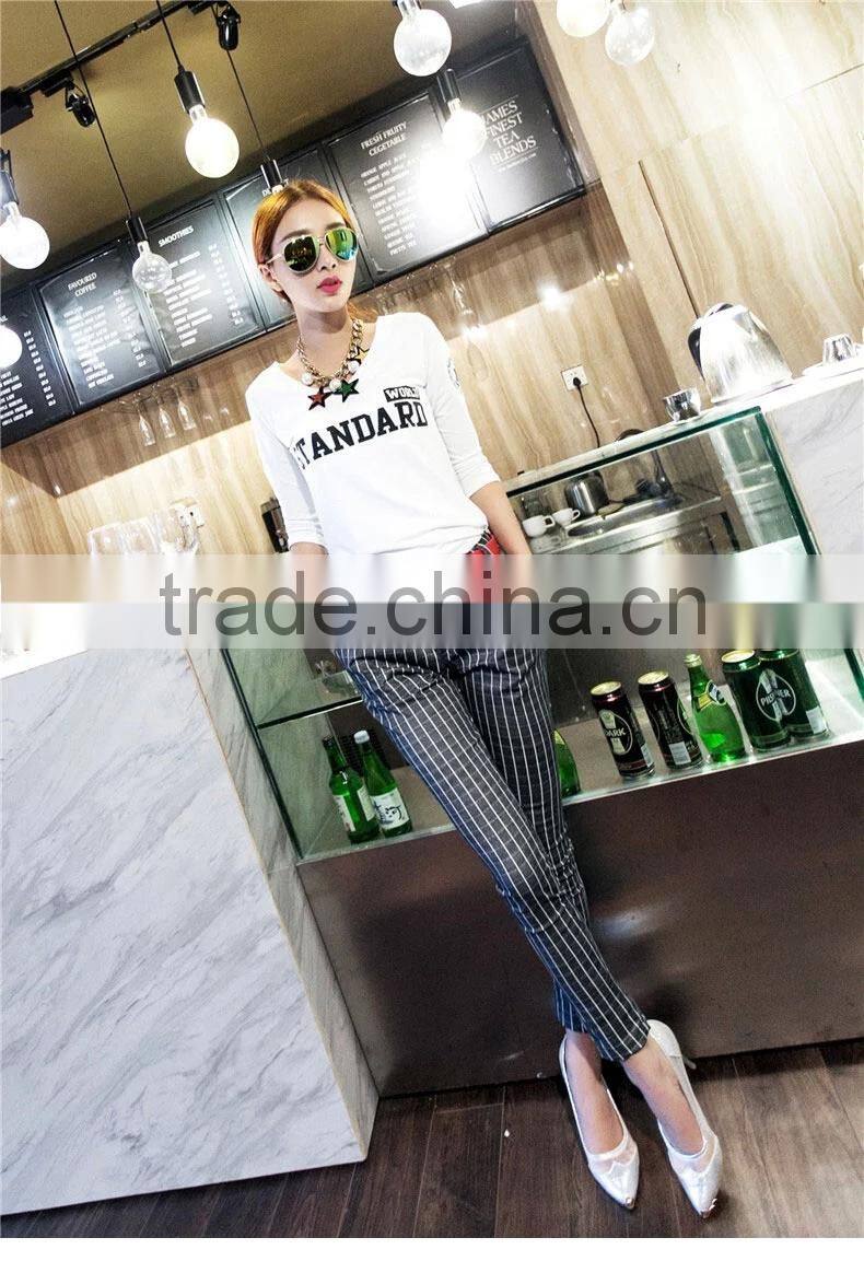 slimming black and white vertical striped pants